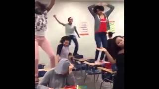 girl falling off desk