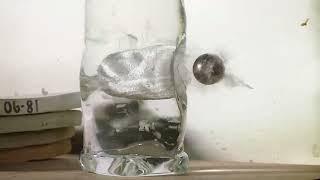 Steel Bearing into Water Bottle