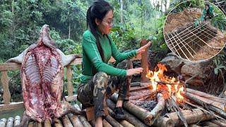 The girl set a trap to catch wild boars in the rainforest.