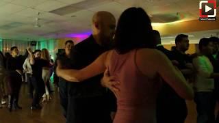 Lynda y DJ Fernando Lopez dancing salsa at Salrica Dance Houston