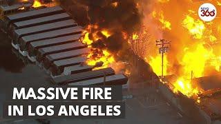 Massive fire burns in industrial area of Los Angeles I Compton Pallet Yard - News 360 Tv