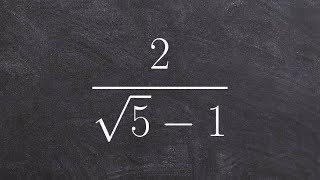 Simplifying a rational radical expression by multiplying by the conjugate