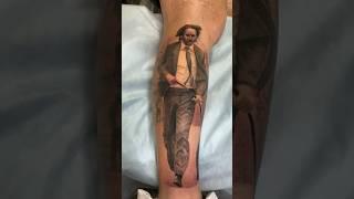 John wick tattoo by tattoo artist Oleg Romanov