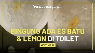 Viral Pria Ini Bingung Ada Tumpukan Es Batu dan Lemon di Toilet Pria