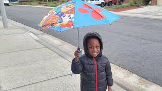 Kid uses Paw Patrol Umbrella in  California Rainstorm