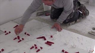 Installation of 12"x24" (30- 60cm) marble tiles with T-Lock™ Fast Tile Leveling System