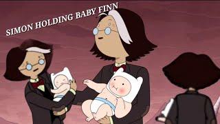 Simon holding baby Finn MOMENTS 