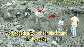 See Miners Searching for Black Sand and Separating It from the Rocks