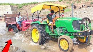 mahindra tractor stuck in river rescued by john deere tractor | tractor pulling videos