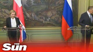 Russia's Sergei Lavrov leaves Liz Truss at the podium in awkward walk off