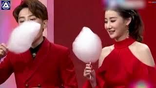 Chinese hostess shoves candy floss in 3 seconds