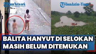 Terekam CCTV Detik-detik Balita di Surabaya Hanyut di Selokan saat Main Hujan, Belum Ditemukan