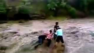 Weather Caught On Camera: Family Caught in Raging Flood