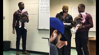 Sweet moment Morehouse professor takes student's baby during class because he couldn't get a sitter