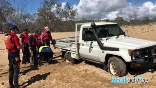 Jet ski riders rescue bogged Toyota LandCruiser