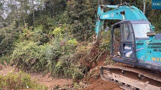Cutting Hills for New Mountain Road with Kobelco Excavator