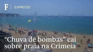 Banhistas fogem de 'chuva de bombas' na Crimeia