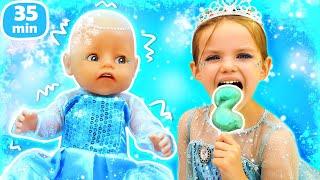 Maya et Lina font de la glace dans le château d'Elsa. Meilleurs jeux pour filles avec Baby Born