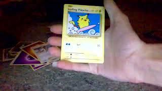 opening 1 evolutions pack (surfing pikachu pulled)!!!