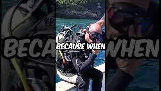 Why scuba divers dive backwards? (scientific explanation) #shorts