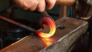 Blacksmithing - Decorative scroll forged from C channel - scrap iron challenge