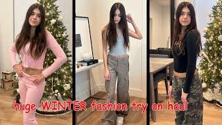 HUGE CLOTHING TRY ON HAUL *Christmas Presents* | Emily and Evelyn