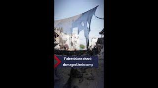 Palestinians checking damaged refugee camp after Israeli raid on Jenin