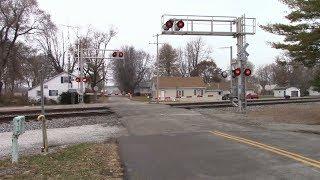 Main Street Railroad Crossing - Two NS Trains in Clymers, Indiana