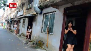 China Street.Backstreet scene and the noise of main street