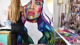 Time lapse painting of a large colorful palette knife portrait