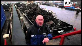 Fishing for bicycles in Amsterdam canals