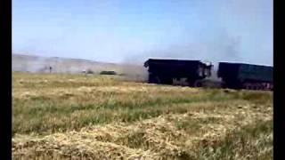 How to put out a grain stubble fire " Russian style"  www.huizingharvest.nl