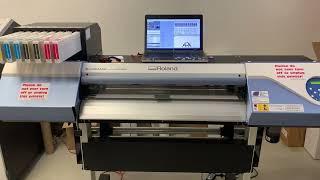 Printing a sticker design with a cutline on a Roland Versacamm printer.