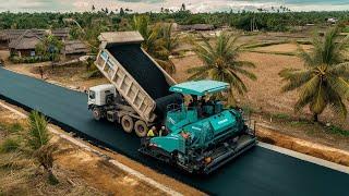 The asphalt paver machine in activity smooth paving technology on the new road #mapmachinehd