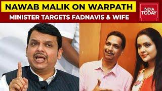 NCP Minister Nawab Malik Claims Link Between Devendra Fadnavis, Wife & Drug Peddler, Tweets Photo