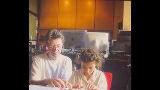 David Bowie and his daughter Lexi playing together