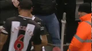 Man getting hit by corner flag