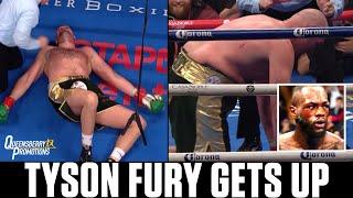 The SHOCKING moment Tyson Fury RISES FROM THE CANVAS after Deontay Wilder thinks he is KNOCKED OUT