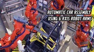 Automatic car assembly using 6 axis robot arms