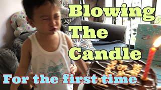 Blowing the candle for the first time