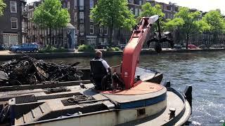 Bicycle fishing -- canal bikes --in Amsterdam