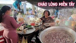 Em gái xinh đẹp bán cháo lòng với nồi cháo lòng quá khủng lúc tờ mờ sáng