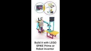 LEGO SPIKE Prime biped robot walks and grabs objects