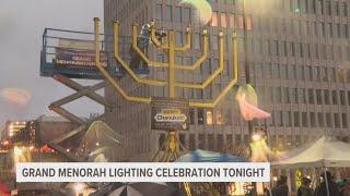 Rain doesn't stop Chabad of Western Michigan from lighting giant menorah