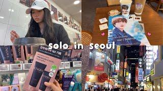 [korea vlog] solo traveling! myeongdong, olive young, bts jin cafe event, what i eat, shopping, etc