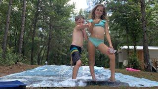 Gymnastics on the slip n’ slide with my brother and my sisters ￼
