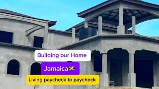 Building our 3 story home in Jamaica, pay check by pay check & while in USA