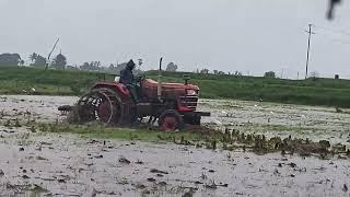 tractor cage wheel driving in rain Jagan Village Drive