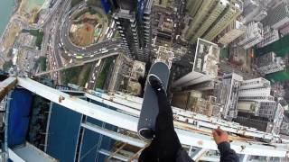 skateboarding on hongkong high building