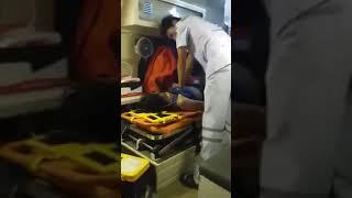 Woman gets CPR on a stretcher